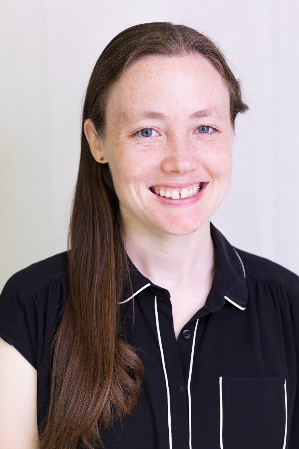 Maggie Cooper's headshot.